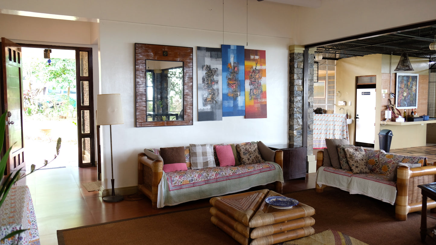 first floor living room with two sofas and large spaces