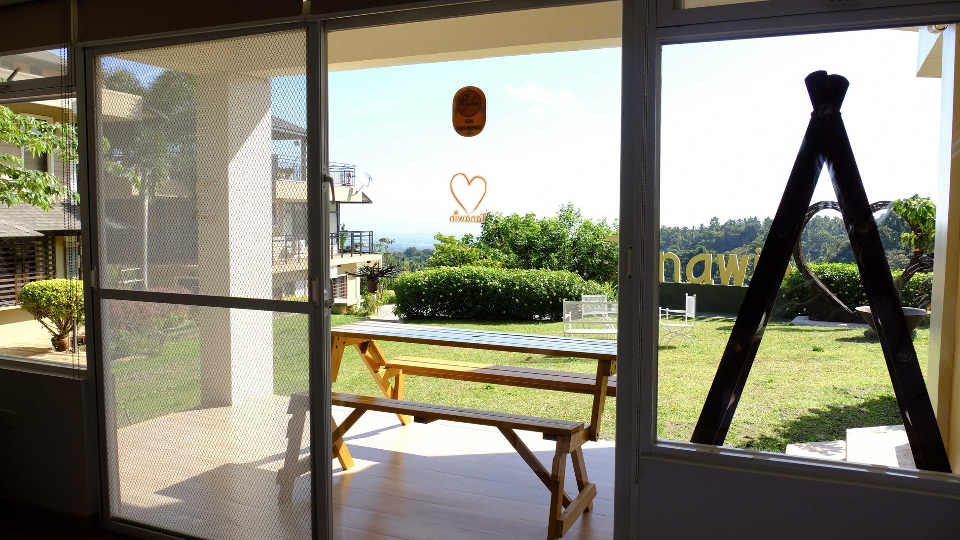 View of Wing porch. First floor. Direct access to garden. 